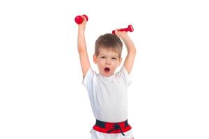 Little boy with a dumbbell photo