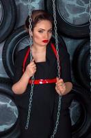 Girl is posing with chains photo