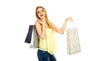 Beautiful girl posing with shopping bags photo