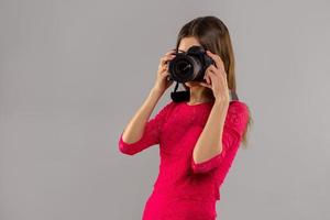 mujer con camara de fotos