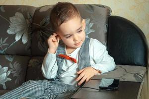 cheerful boy listening to the music photo