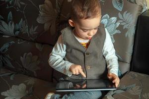 little boy with tablet photo