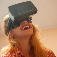 woman in virtual reality helmet photo