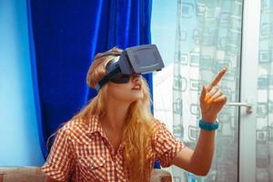 girl in virtual reality glasses photo