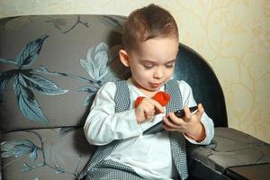 young beautiful boy with bowtie photo