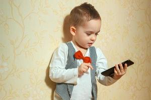 cheerful young boy in elegant suit photo