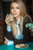 beautiful girl with cup of coffee photo