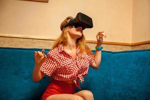 woman in virtual reality helmet photo