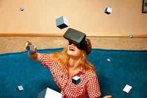 woman in virtual reality helmet photo