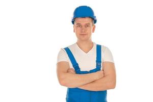 young male builder with crossed hands photo