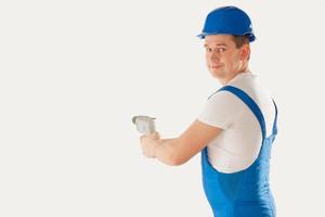 man with drill in hands photo