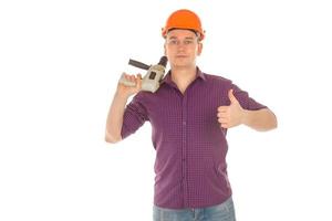 man builder with drill in his hand photo