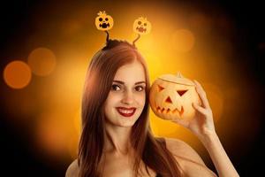 cheerful beauty woman in halloween style clothes photo