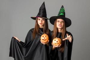 women in halloween style clothes photo