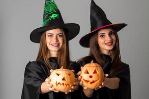 Cheerful girls in halloween style clothes photo