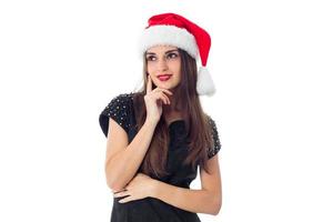 brunette girl in santa hat photo