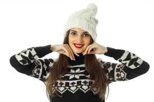 young girl in warm winter sweater photo