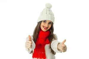 brunette girl in warm sweater and red scarf photo