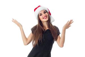 cutie young girl in santa hat photo