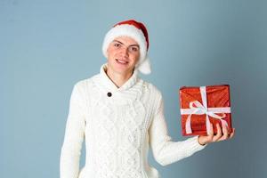 cheerful guy with gift box photo