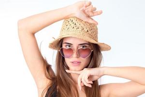 girl in sunglasses and straw photo