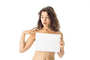 nude brunette girl with placard photo