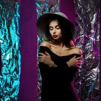 young beauty woman in hat with wide brim photo