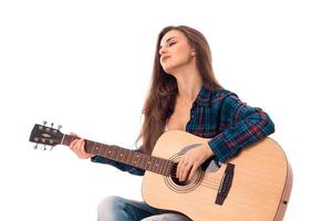 glamour lady with guitar in hands photo