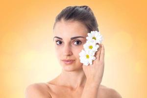 Young girl takes care her skin. photo