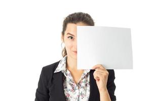 woman in uniform with white placard in hands photo