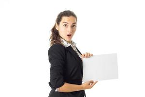 woman in uniform with white placard in hands photo