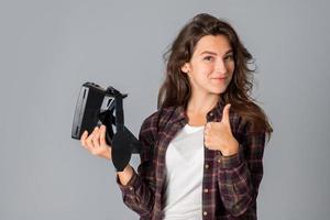 girl testing virtual reality glasses photo