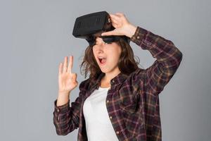 beauty girl testing virtual reality glasses photo