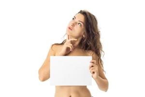 nude brunette girl with placard photo