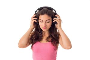 girl in headphones in studio photo