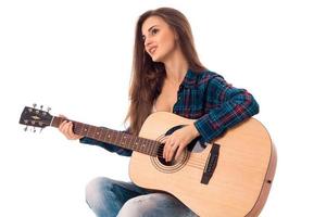 dama glamorosa con guitarra foto