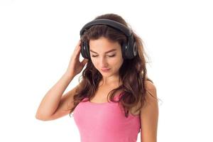 girl in headphones in studio photo