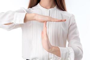 girl holds before itself hands crossed between  close-up photo