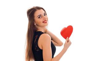 beautiful young girl with long hair is smiling and holding a Valentine Sweetheart photo