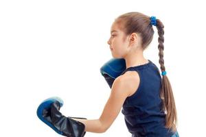 young girl practicing boxing photo