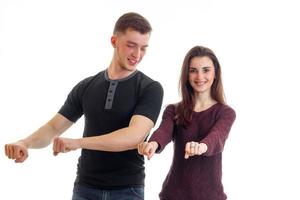 gay young guy and girl laughing and dancing hands photo