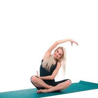 Woman practicing yoga photo