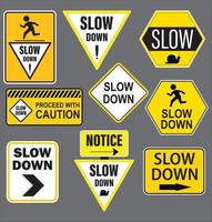 Slow Down yellow road sign isolated on gray. vector