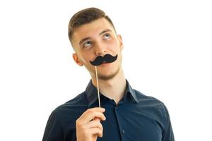 Portrait of a guy with a paper mustache photo