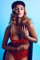 Portrait of seductive adult woman with big natural breast photo