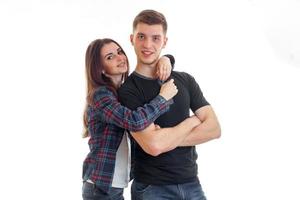 pin-up girl in a Plaid Shirt hugging a young guy smiling photo