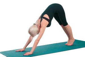 Woman practicing yoga photo