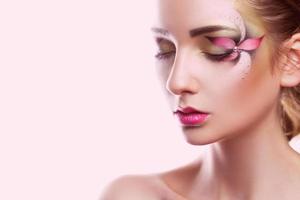 Sensual portrait of young woman with creative make up photo