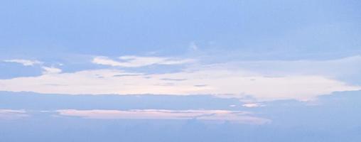 Image of a partly cloudy and partly clear sky during the day photo