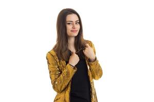 pretty glamour woman in golden jacket and sunglasses photo